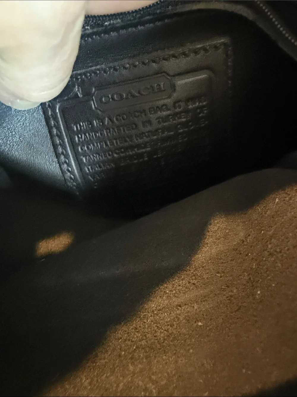 Coach sleek black